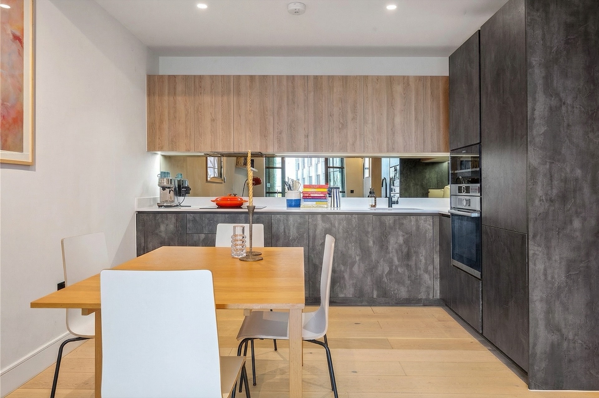 Kitchen detail: smoked timber and steel-toned cabinetry